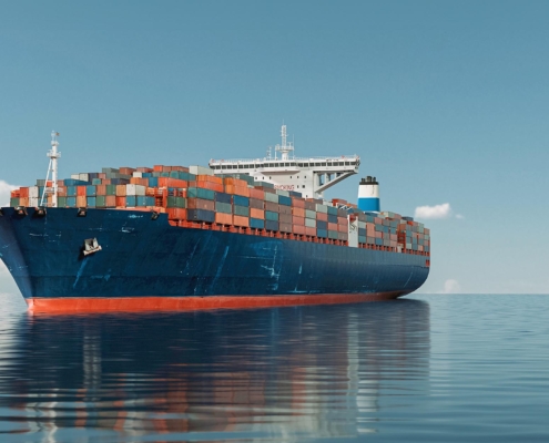 Side view of a cargo ship on the ocean